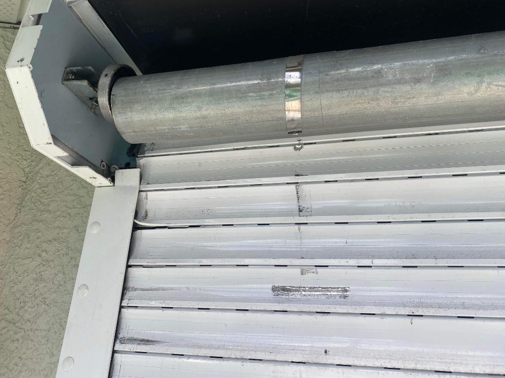 Worn hurricane shutter component