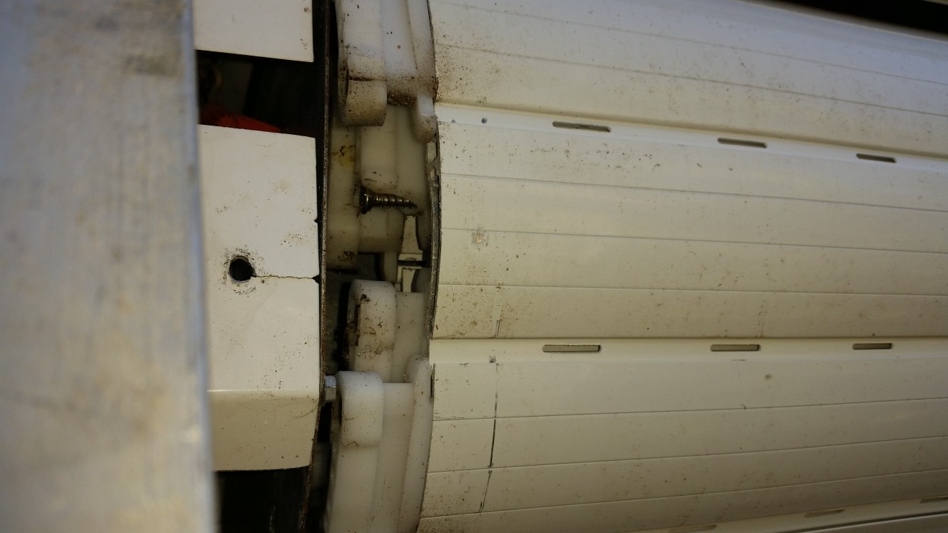 Hurricane shutter requiring repair
