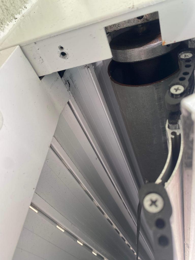 Hurricane shutter requiring service